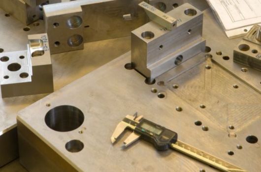 In-house tool room for precise stamping die design and building